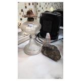 Oil lamp and rock