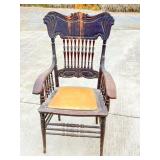 Ornately Carved Wooden Armchair