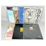 Seven Vinyl Record Albums