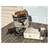 Two Electric Power Drills with Boxes