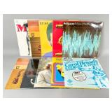 12 Vinyl Records Featuring Various Genres