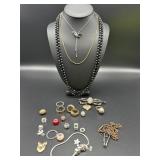 Necklaces, Rings, and Charm Bracelet