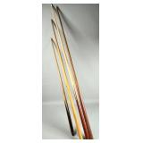 Four Wooden Pool Cues