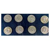 Eight Kennedy Half Dollar Coins