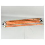 Four Wooden Pool Cue Sticks
