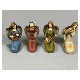 Four Painted Angel Figurines
