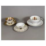 Three Porcelain Souvenir Teacups and Saucers