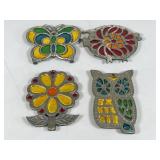 Four Decorative Metal Trivets