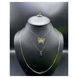 Three Gold-Tone Necklaces with Pendants