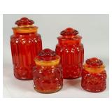 Four Amberina Glass Canisters with Lids