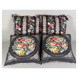 Four Floral Patterned Throw Pillows