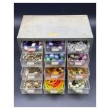 Beaded and Metal Jewelry in Storage Cabinet