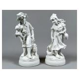 White Porcelain Figurines - Boy and Girl