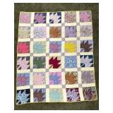 Patchwork Quilt with Leaf Pattern