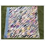 Patchwork Quilt with Striped Pattern