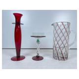 Red and Clear Glass Vessels