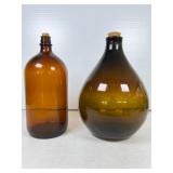 Two Amber Glass Bottles with Cork Stoppers