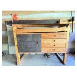 Wooden Workbench with Metal Vise and Storage