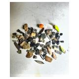 Stone Fragments with Fishing Lures