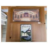Two Framed Decorative Wall Signs