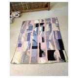 Patchwork Quilt with Green Binding