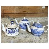 Three Blue and White Ceramic Teapots