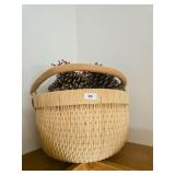 Woven Basket With Pinecone Wreath