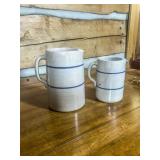 Two Stoneware Pitchers with Blue Stripes