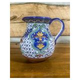 Hand-Painted Ceramic Pitcher with Floral Motif