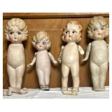 Four Bisque Jointed Figurative Dolls