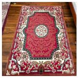 Rectangular Red Area Rug With Ornate Border