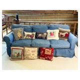 Blue Sofa with Assorted Decorative Pillows