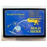 Framed Trade-A-Plane Advertising Sign
