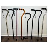 Eight Adjustable Walking Canes