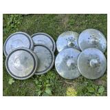 Eight Metal Ford Hubcaps