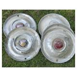 4 Vintage Metal Hubcaps with Emblems