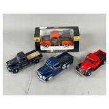 Four 1:24 Die-Cast Pickup Truck Models