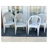 Four Plastic Outdoor Armchairs