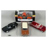 Four 1:24 Scale Die-Cast Model Cars