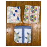Three Patchwork Quilts in Varied Patterns