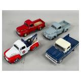 Four Die-Cast Pickup Truck Models