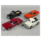Four Die-Cast Model Vehicles