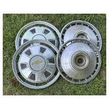 Four Chevrolet Hubcaps