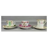Three Porcelain Demitasse Cup and Saucer Sets