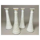 Four Patterned Milk Glass Vases