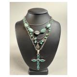 Two Silver Tone Necklaces With Green Accents