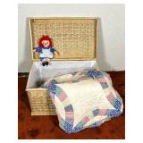 Wicker Chest with Rag Doll and Patchwork Quilt