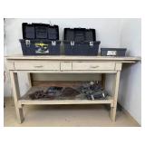 Workbench With Toolboxes and Assorted Tools