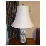 Porcelain base lamp with raised floral design and elegant flare shade and porcelain finial…..27-1/4 tall