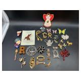 Vast assortment of vintage and modern brooches